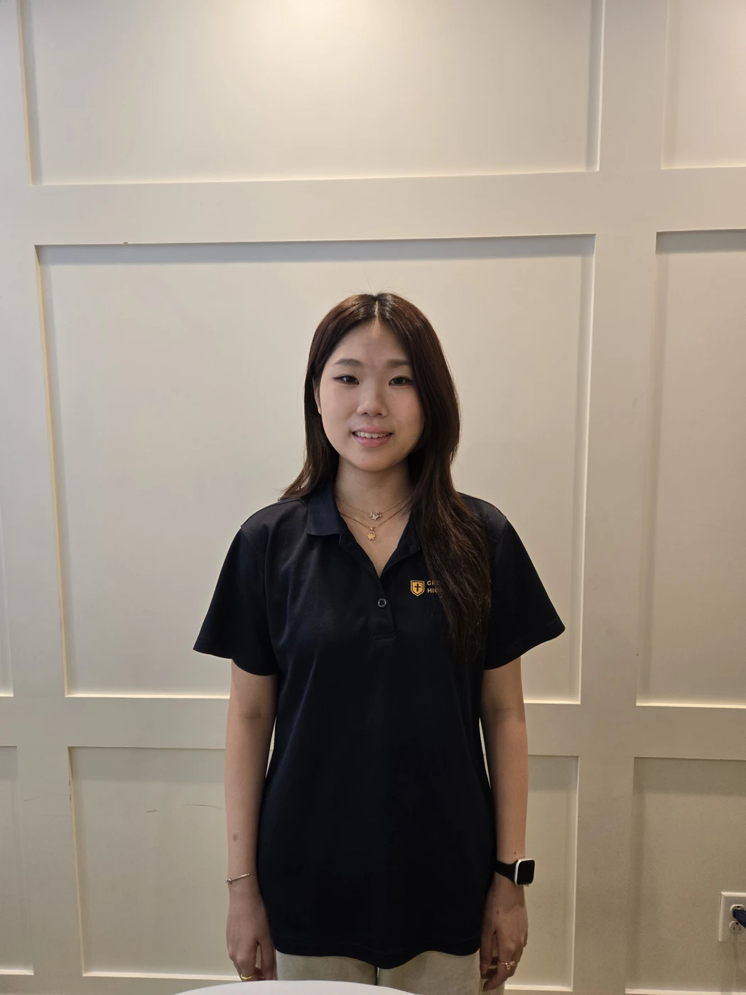 Jeemin Park smiling in her Crean Lutheran school uniform